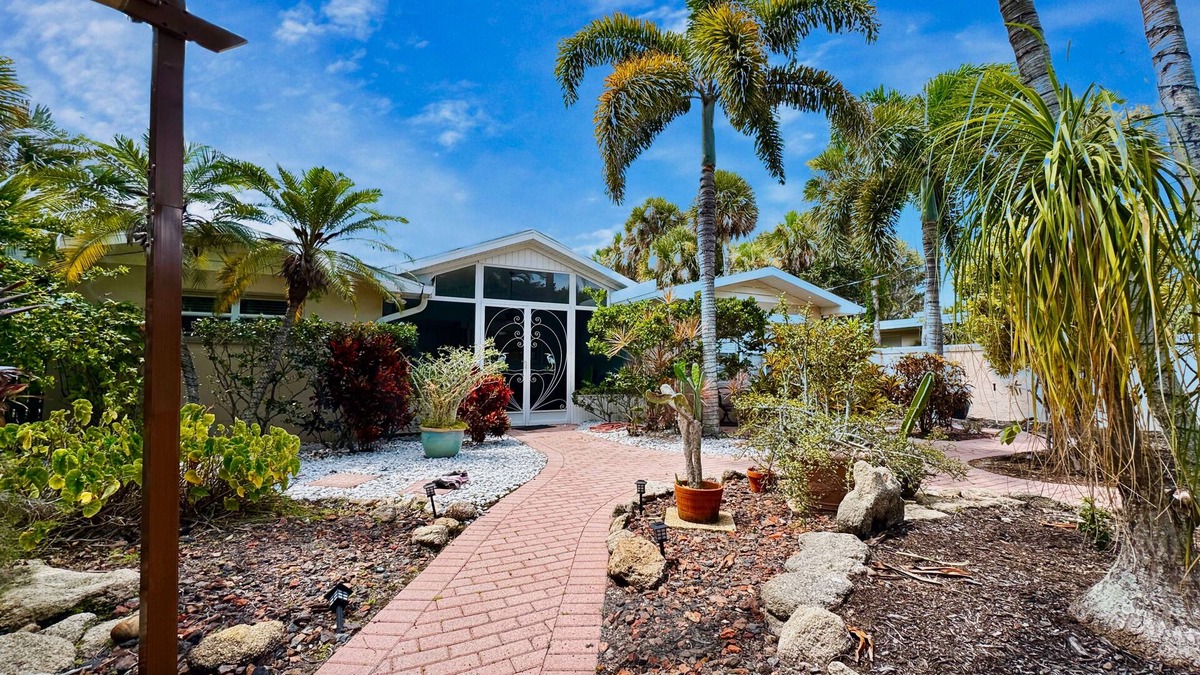 Cocoa Beach House | Private Oasis at the Beach with HEATED Pool, Dock and Boat….Dolphin paradise!