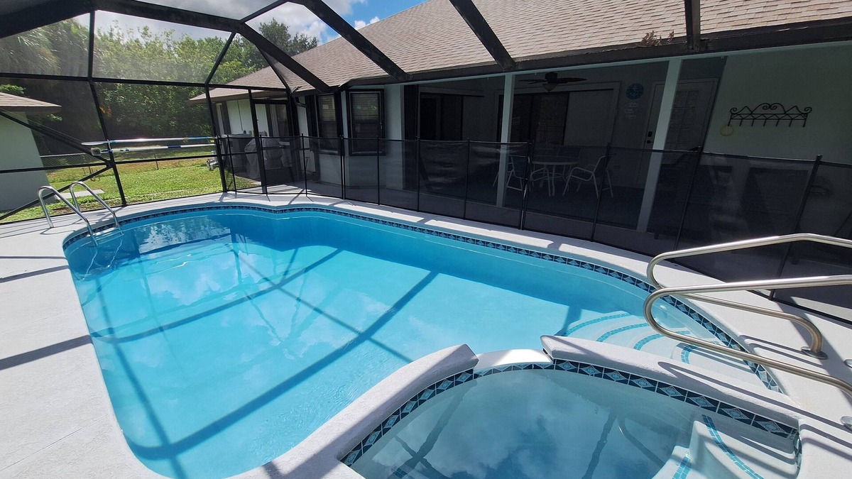 Sebastian Highlands House | Private Oasis! Heated Pool, Lanai with Poolside Bathroom, Grill, Mins to Beach!