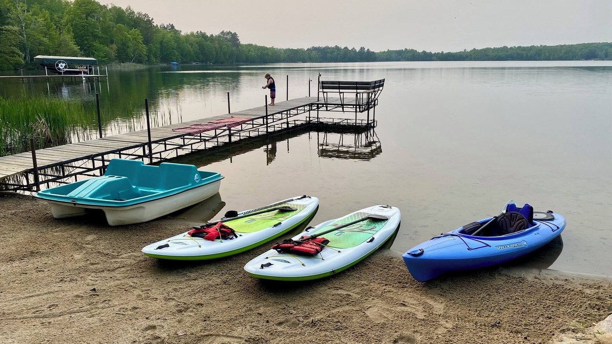 Grand Rapids House | Private sand beach, screen porch, spacious rooms, paddle boards and more!
