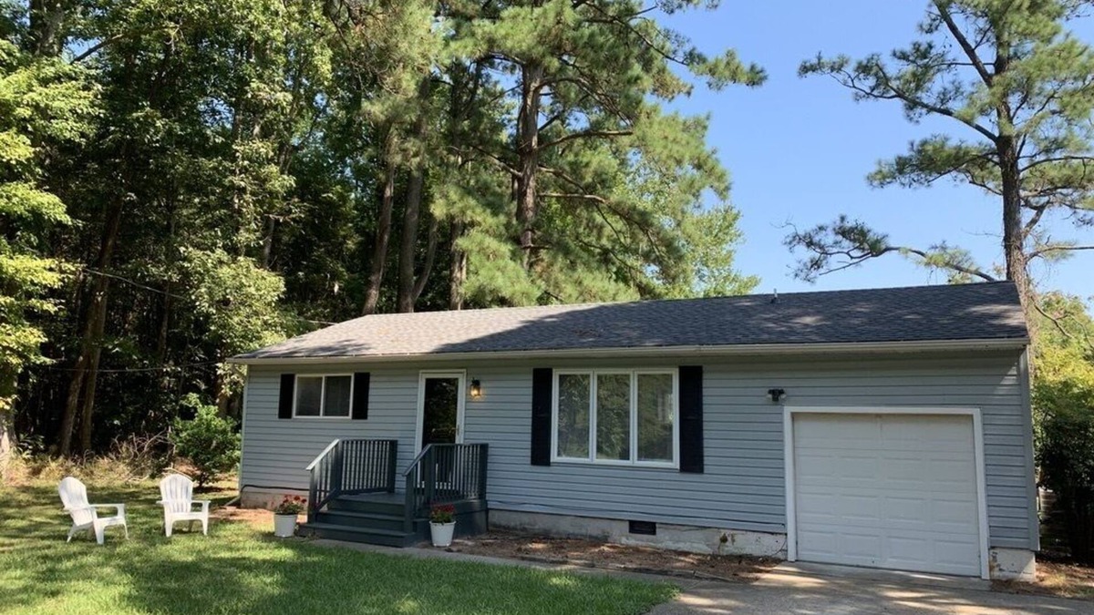 Fentress House | Private single family home with a natural wooded setting providing much privacy.
