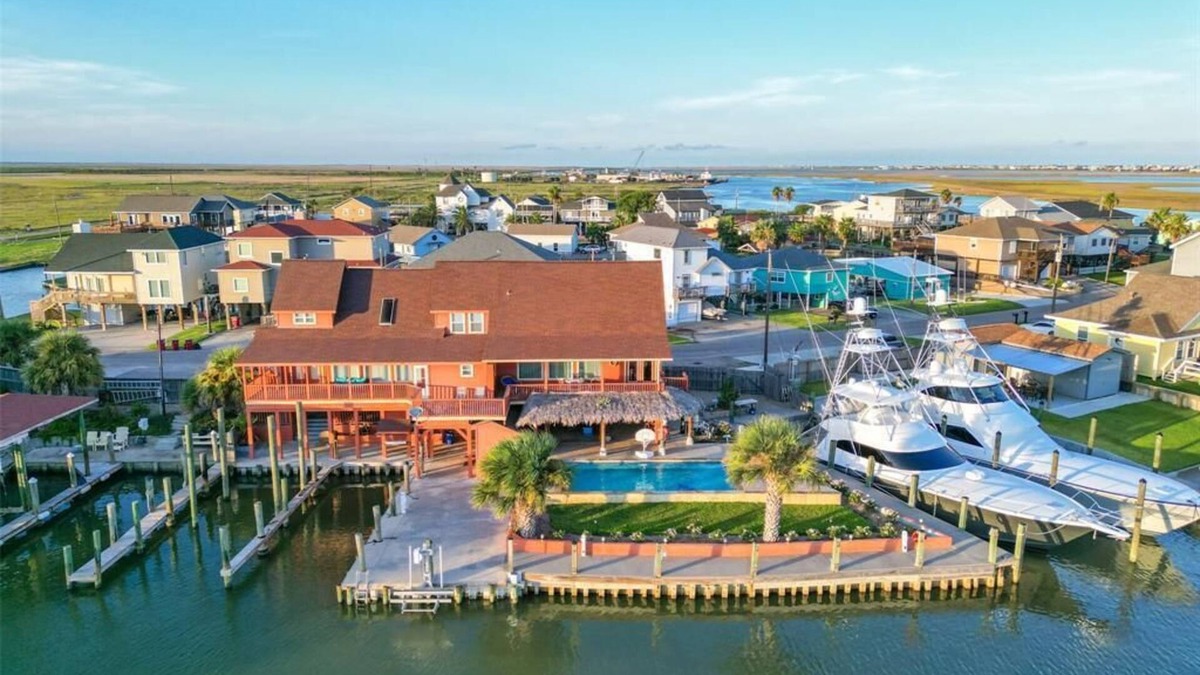 Surfside Beach House | Private swimming pool, fishing dock! Something to offer everyone!