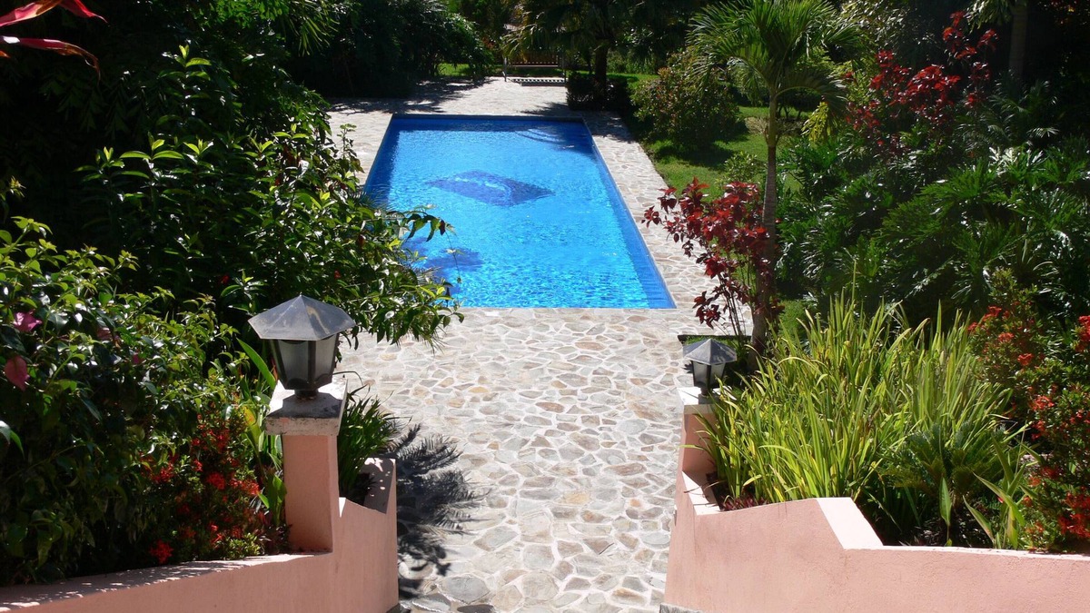 Atenas House | Private villa with lush tropical garden and big heated pool