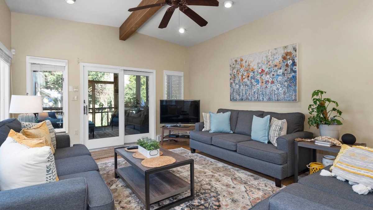 Historic District House | Private yard and screened porch at Historic happy home, steps to Main Street with parking