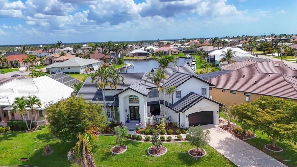 Punta Gorda House | Punta Gorda Isles 4-Bedroom Private Pool Home on Canal with Boat Dock