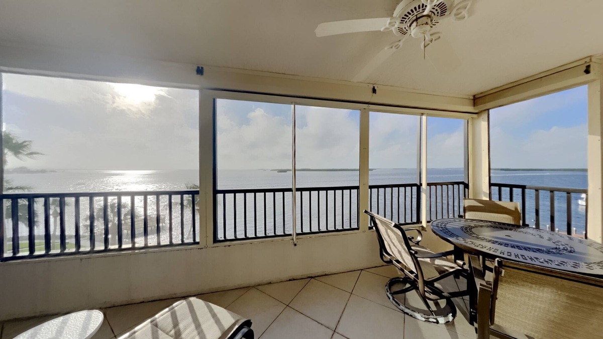 Punta Rassa Condo | Punta Rassa #404 TRANQUIL SPACIOUS 2 BED CONDO WITH GORGEOUS SUNSET WATER VIEWS