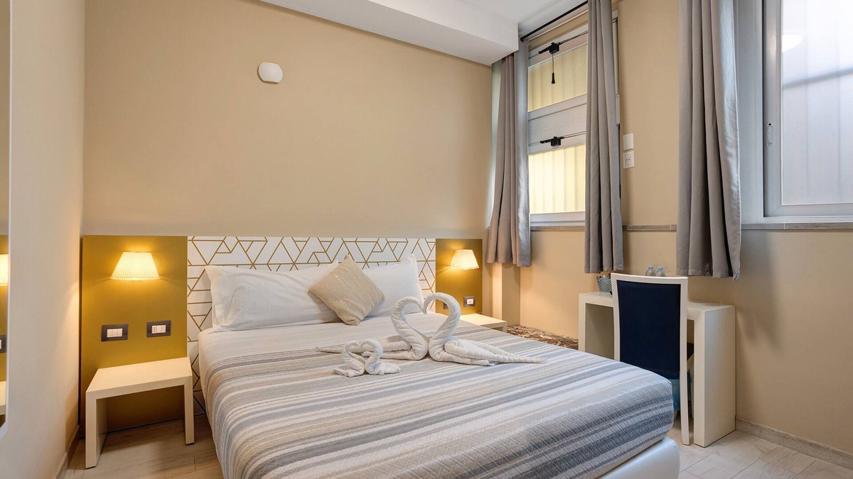 Quarto Cagnino Apartment | Quadruple Room with Wi-Fi and Air Conditioning