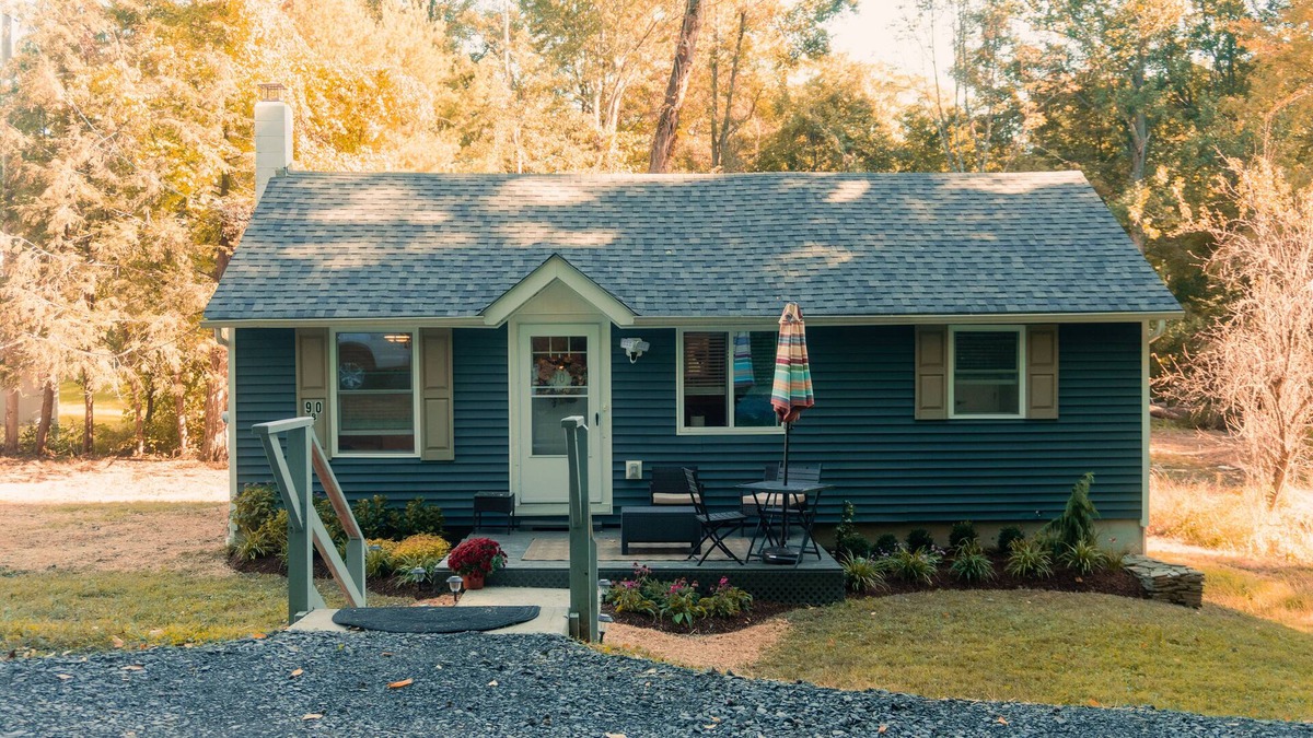 Bloomingburg Cottage | Quaint and Cozy Couples Getaway. Cottage set in a woody area.