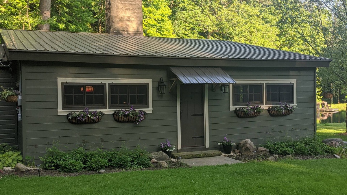 Wooster Cabin | Quaint Newly Remodeled Cabin with Stone Fireplace - Private Hot Tub - King Bed