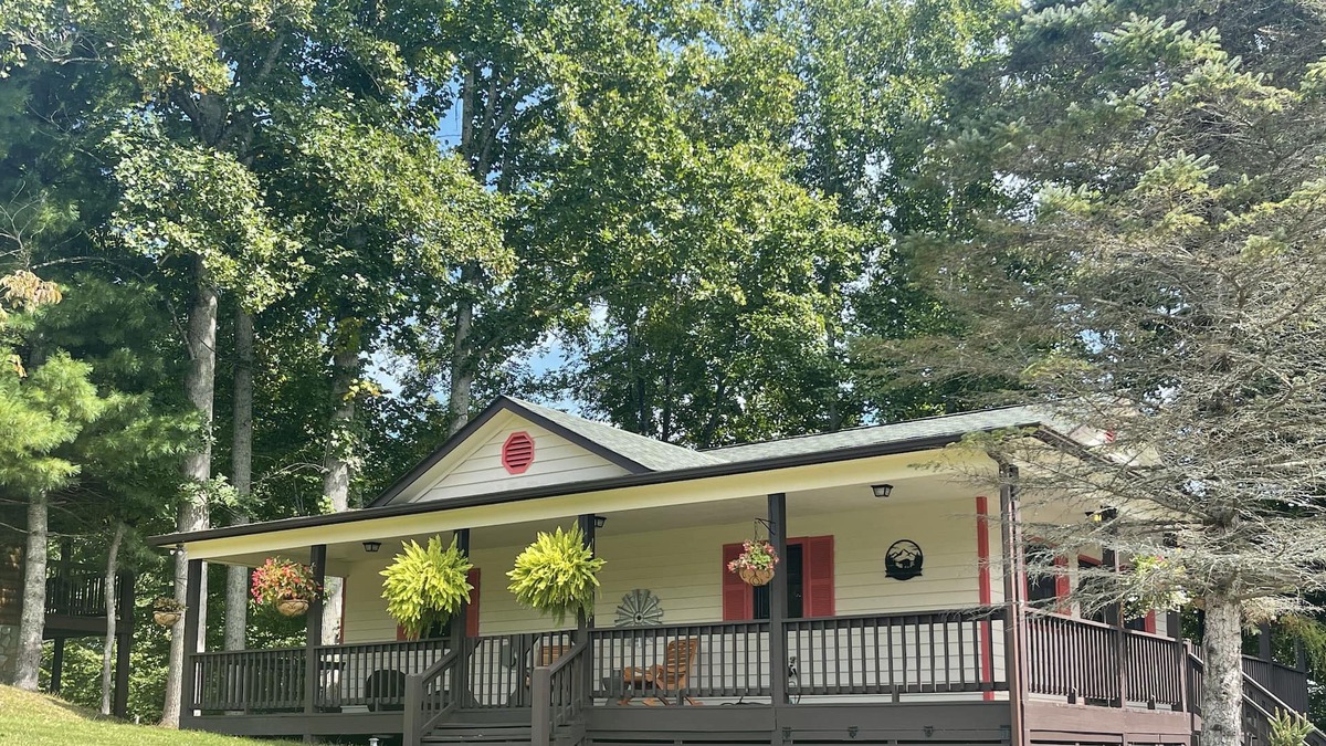 Piney Creek Cabin | Quaint Piney Creek cabin with wrap-around deck will restore you!
