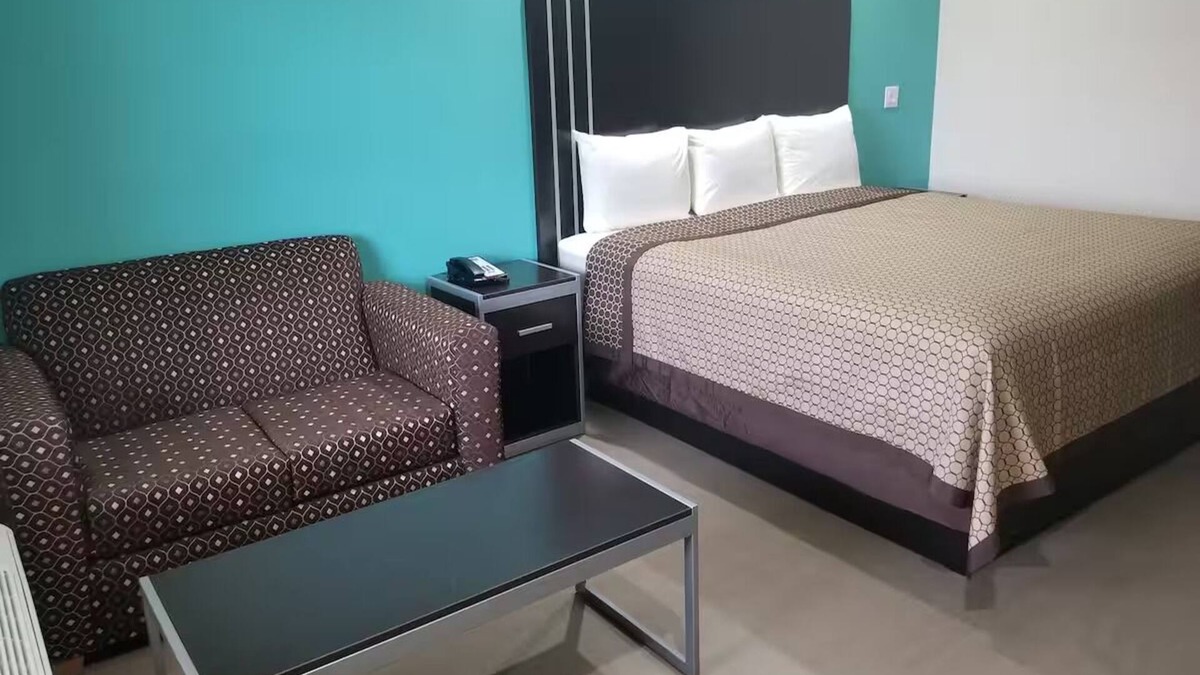 Bay City Hotel | Queen Bedroom with Kitchenette, Perfect for a Comfortable Stay in Bay City