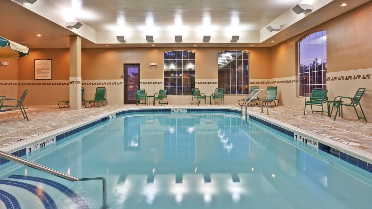 Rochester Condo | Queen Suite with In-Suite Conference Space Near the University of Rochester