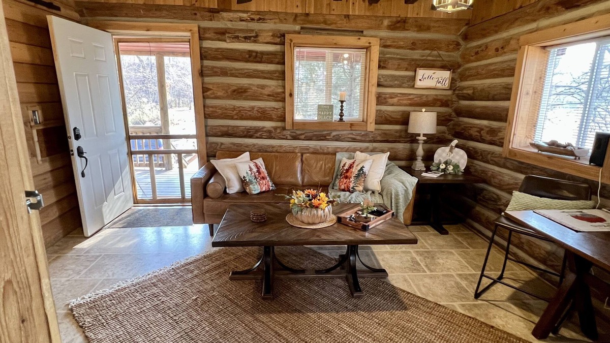 Hallsville Cabin | Quiet Cabin on Walnut Creek, Covered Deck, Hot Tub, Swimming Hole, Shelter House