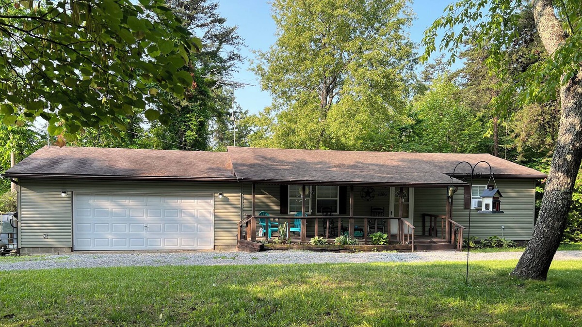 Wakefield House | Quiet & cozy retreat with firepit, front porch, back balcony, walk-in tub & more
