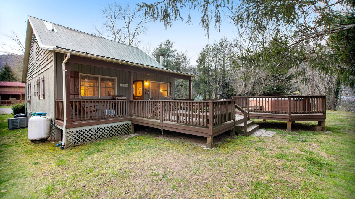Cullowhee Cottage | Quiet dog-friendly riverfront house with large back deck, hot tub, fireplace