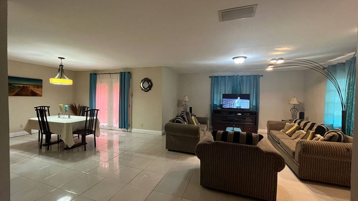 Bahamas Terrace House | Quiet getaway near Xanadu Beach, Freeport with Central Air, WiFi & free parking.