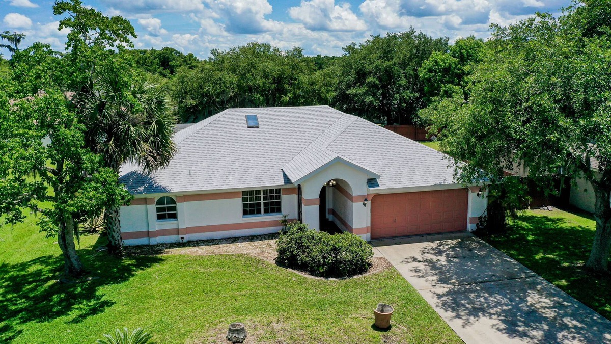 Palm Coast House | Quiet home with enclosed yard, heated pool with jets, & screened lanai