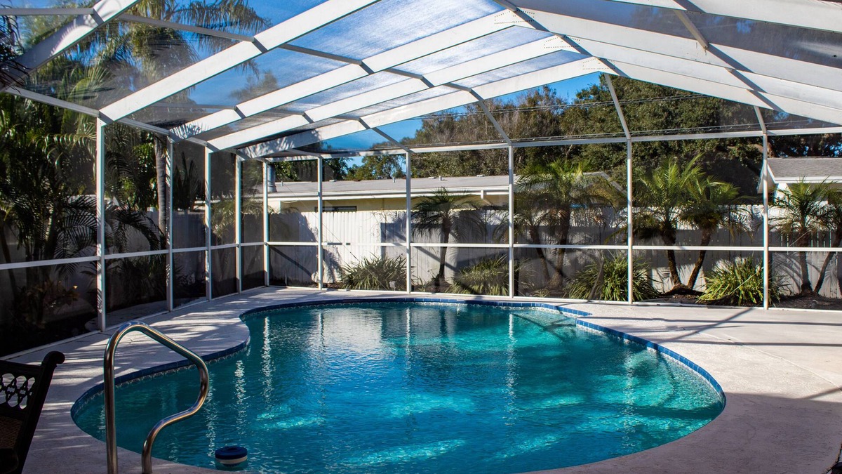 Largo House | Quiet home with Salt Water Heated Pool, next to Largo Golf Course & IRB!