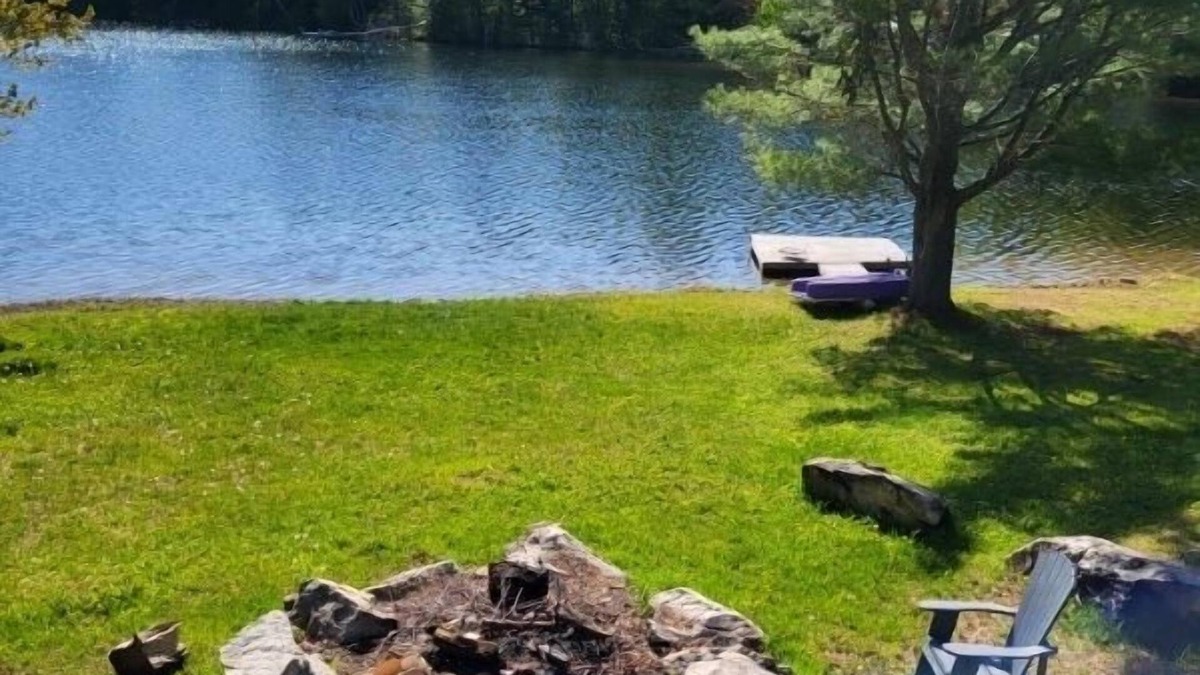 Highlands East Cottage | Quiet Lakefront Getaway - with Hot Tub & Wifi at Waters Edge 160 ft of Shoreline