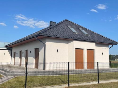 Czarnowasy House | Różana 51