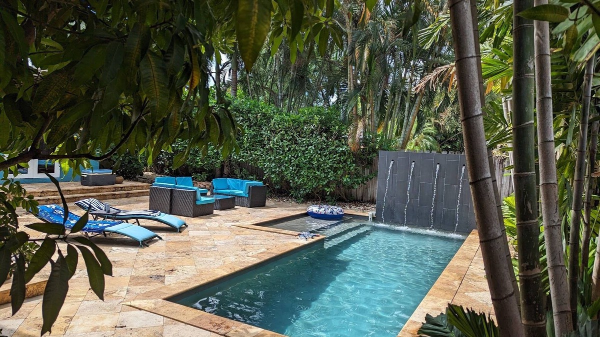 Poinsettia Heights House | Rated top 5% of homes. 3BR 3BA Private Oasis Home with Heated Salt Water Pool.