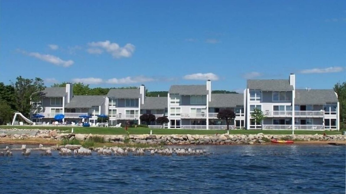 Boyne City Condo | RECENTLY REMODELED directly on Lake Charlevoix Boat Slip Pool Deck Walkout Wifi
