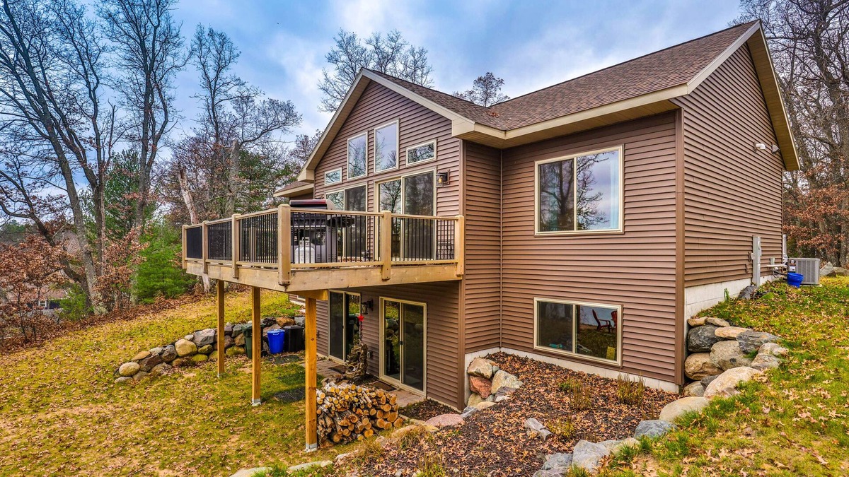 Tomahawk House | Recreational lakefront home w/private dock, trails access, & washer/dryer