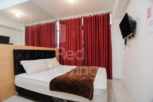 Cikokol Apartment | RedLiving Apartemen TreePark City - Hunian Idamanku Tower Alpine