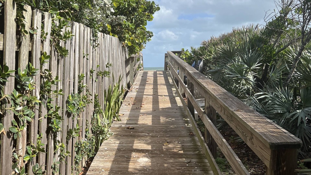 Sunnyland Beach House | REDUCED PRICE!3 BR CANAL FRONT w/river/ocean access & beach! Bring boat!