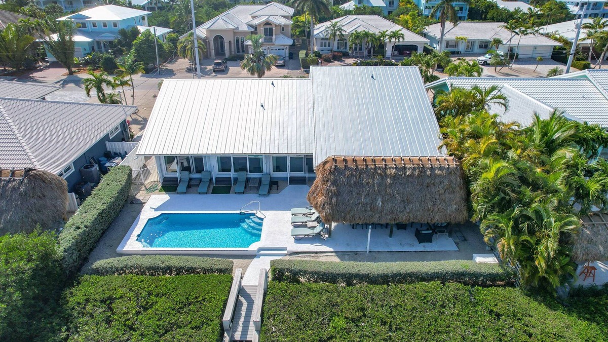 Coury House | Reel 'Em In: Your Beautiful KCB Retreat, Private Pool, Dock, Tiki Hut, Cabana Club & Dog-Friendly!