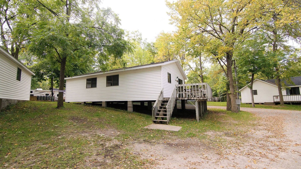 Richmond Cabin | Reel 'Em Inn, a spacious 4BR cabin with queens in every room at Riverside Resort