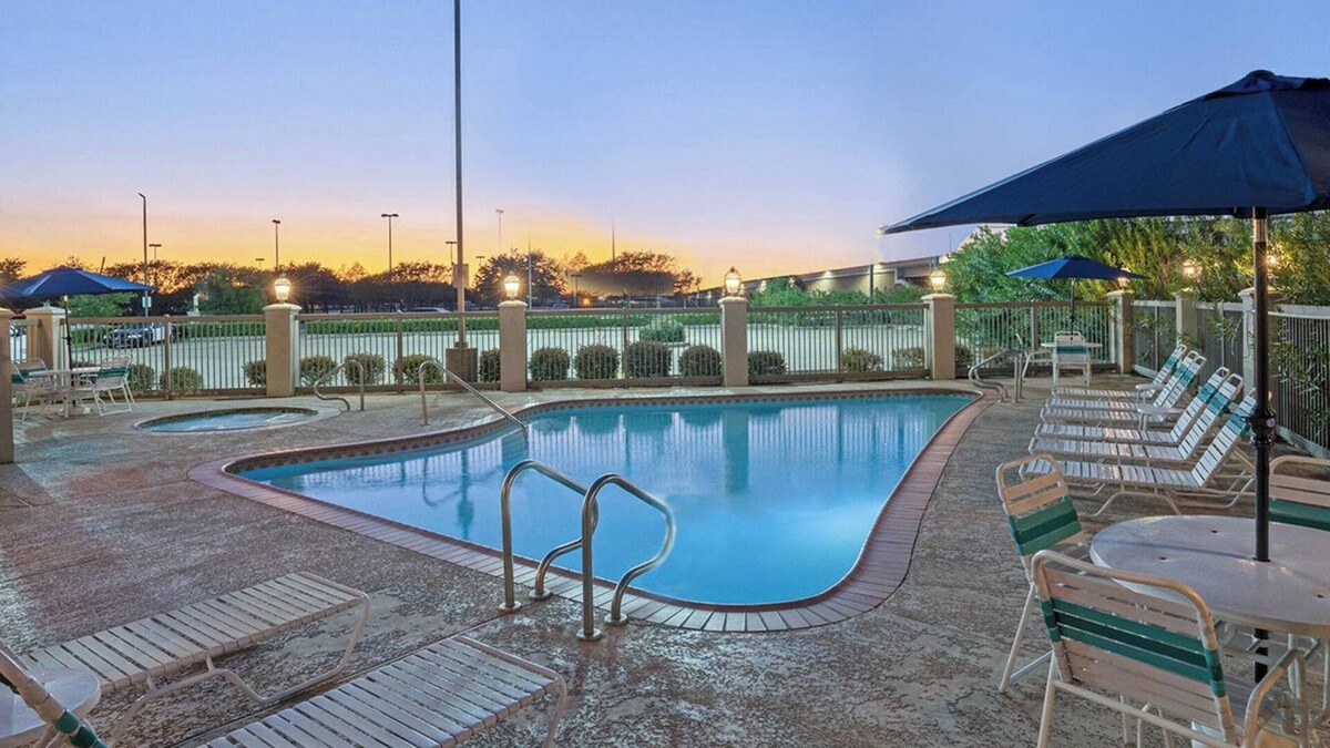 Westchase Hotel | Refined Room for Professionals with Poolside Zen | Free Parking