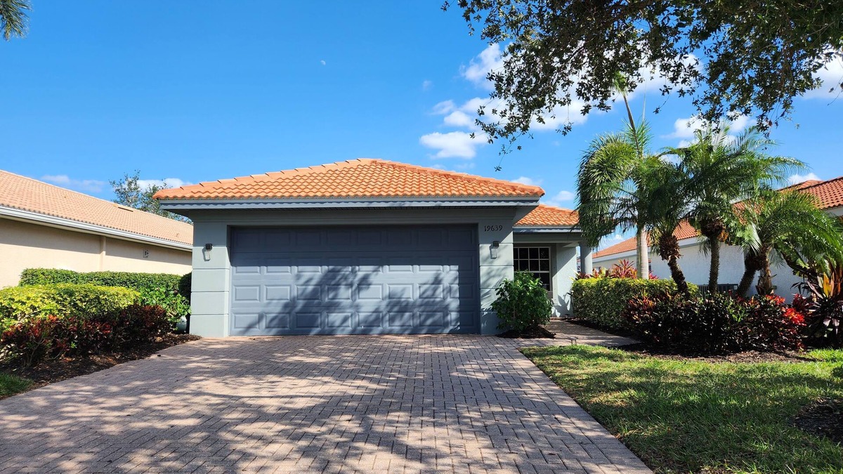 Cascades House | Refreshing Lake View Home in Upscale Estero Community