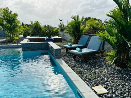 Ducos Apartment | Refuge PêBê Joli logement au coeur d'un immense jardin tropical