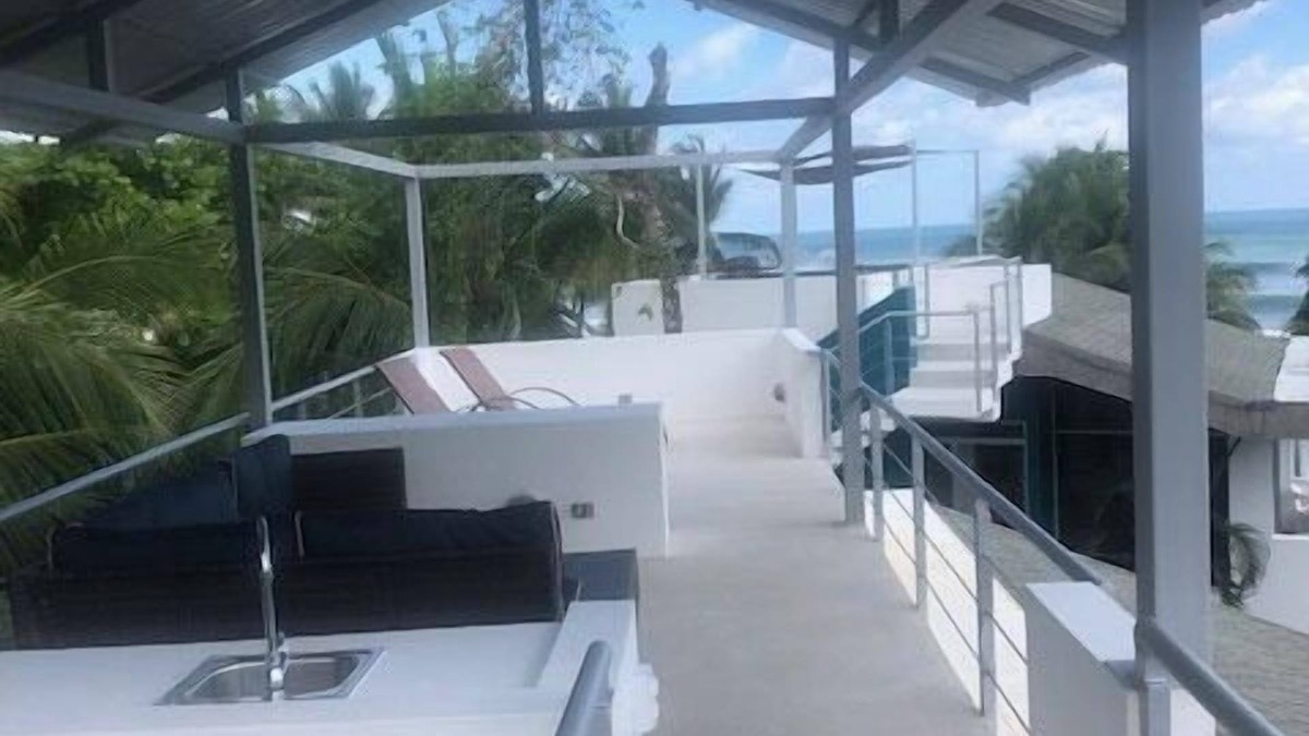 Esterillos Oeste Villa | Relax and enjoy sea breezes and sea views on the roof top patio.