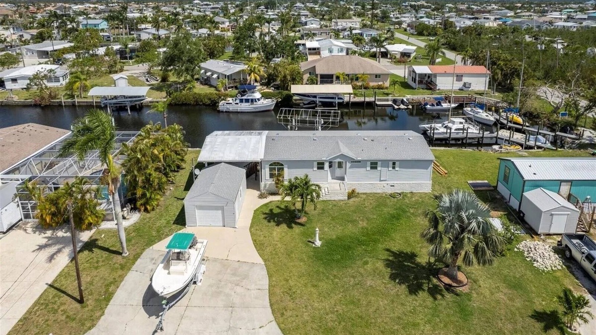 Charlotte Park House | Relax at 710 El Dorado Dr, canal waterfront property with private dock