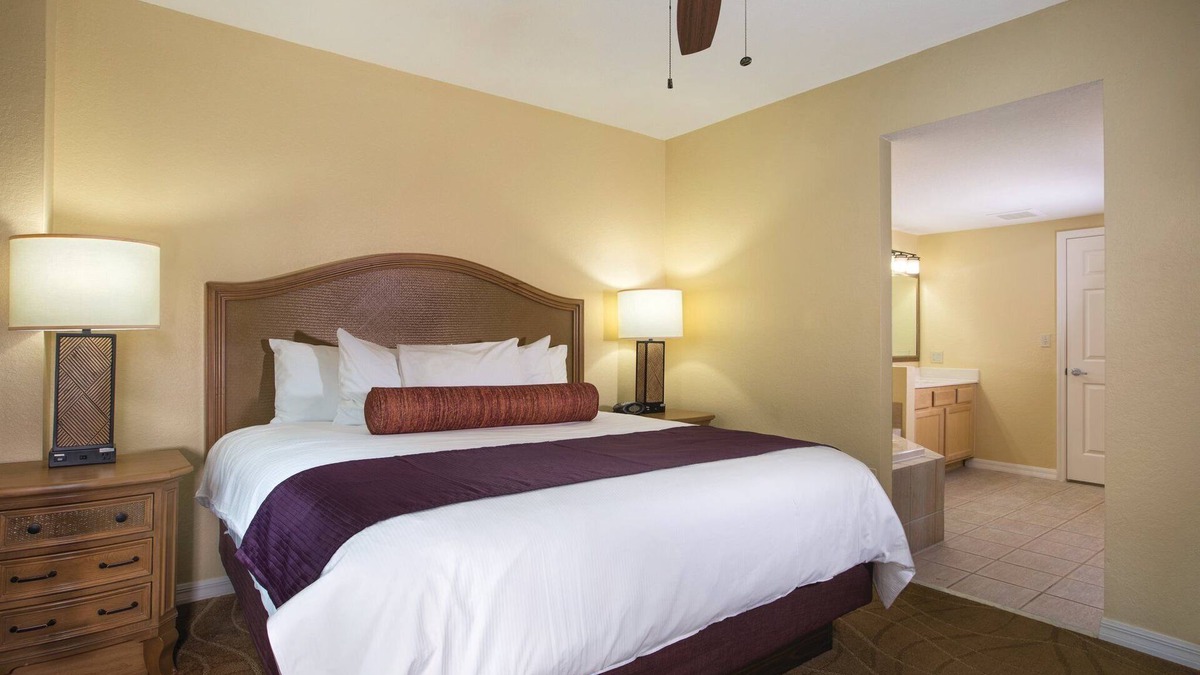 Survey Creek Resort | Relax at our Palm Tree secluded Resort with a poolside bar and waterslide