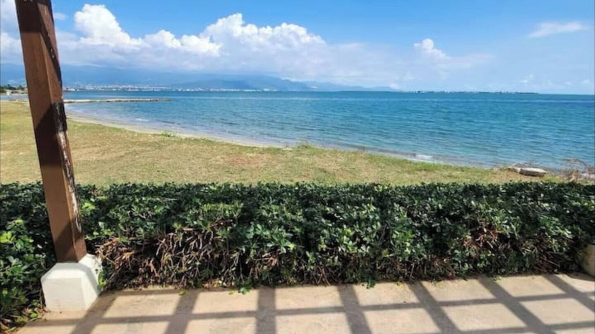 Portmore Villa | Relax by the pool with the sounds of waves and enjoy ocean and mountains views