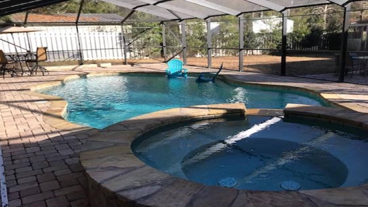 Foley House | Relax by the private pool! Five bedrooms await you near Gulf Shores Beach