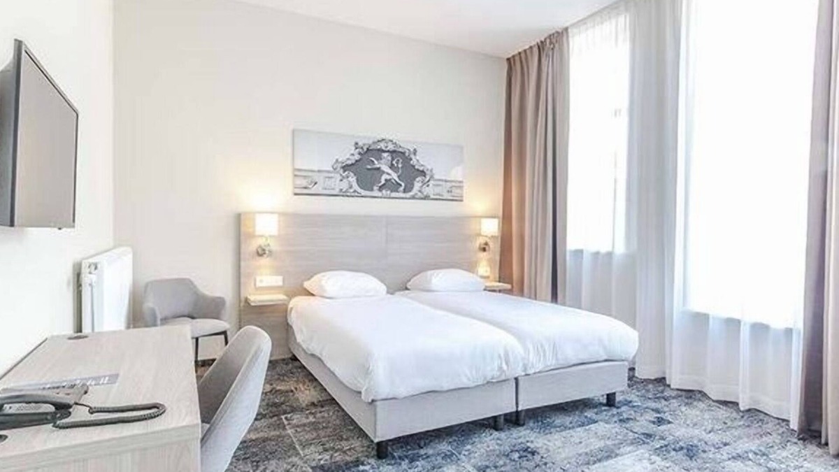 Leeuwarden Hotel | Relax in Historic Luxury with Garden Dining, Near Galleries and Oldehove