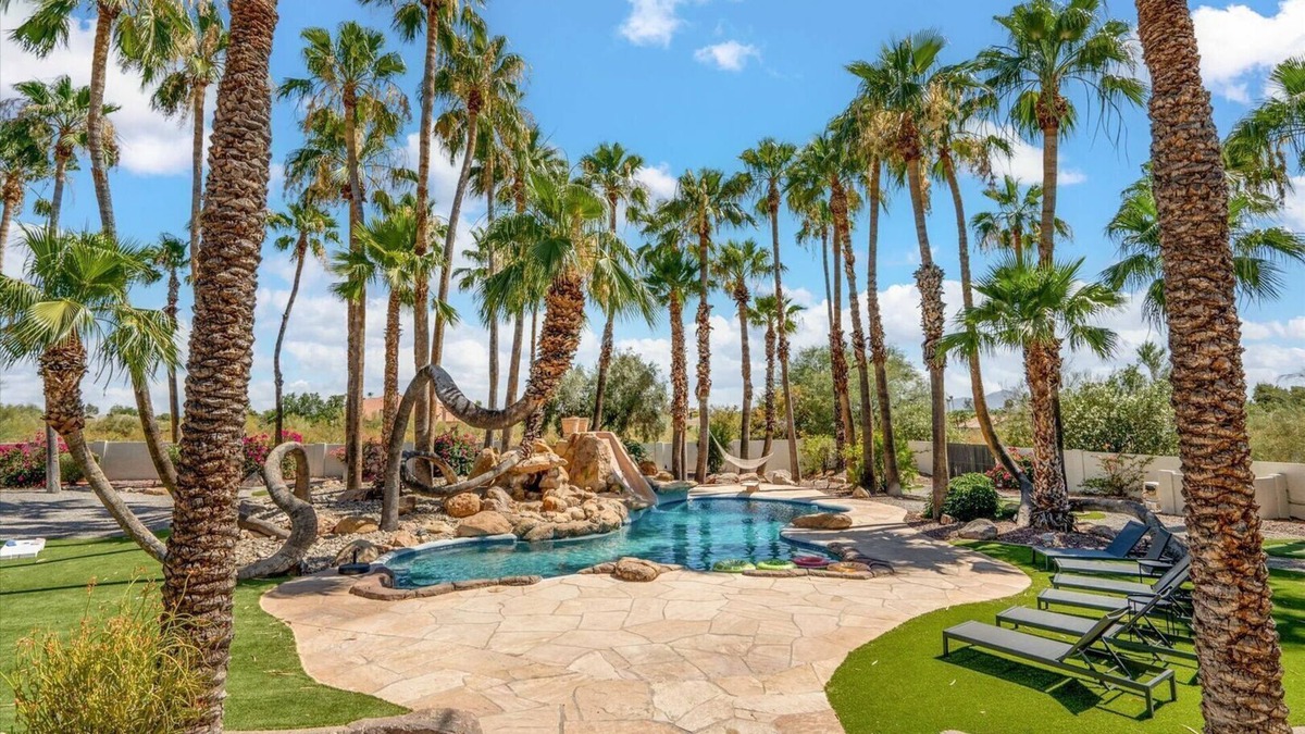 Cactus Acres Villa | Relax in luxury at our 7-bed, 5-bath estate with rooftop deck, pool, and more!