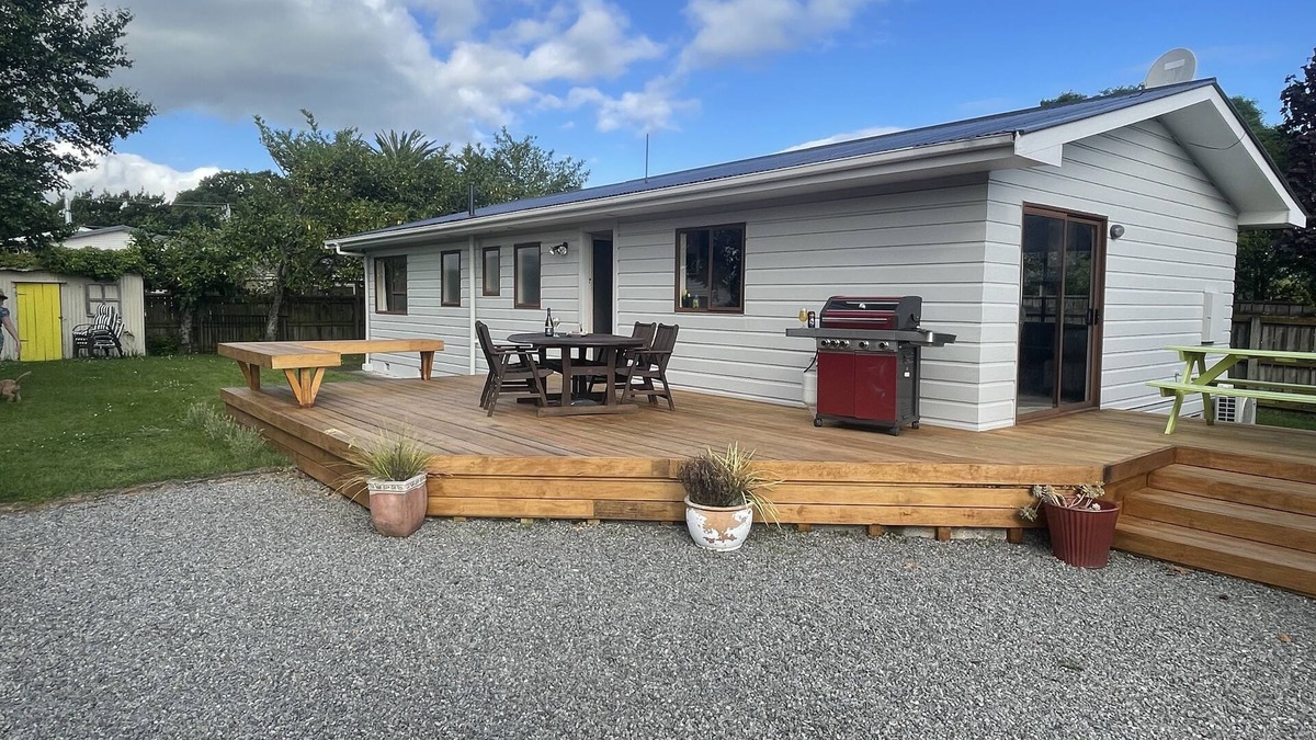 Martinborough House | Relax in Venice St with four bedrooms and two bathrooms minutes from the square