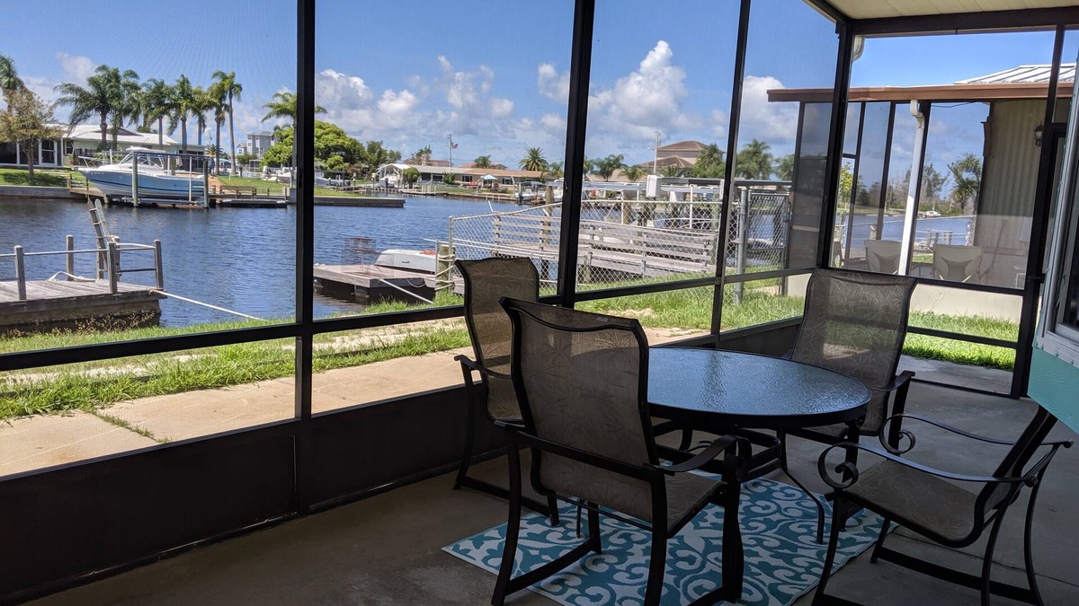 Port Richey House | Relax in your chair on the floating dock as the tide rolls in & catch a few fish