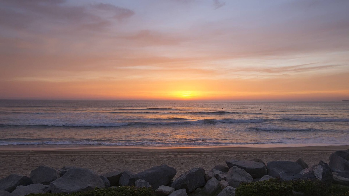 Imperial Beach Condo | Relax on the deck patio or beach and watch the dolphins frolicking in the wavesn