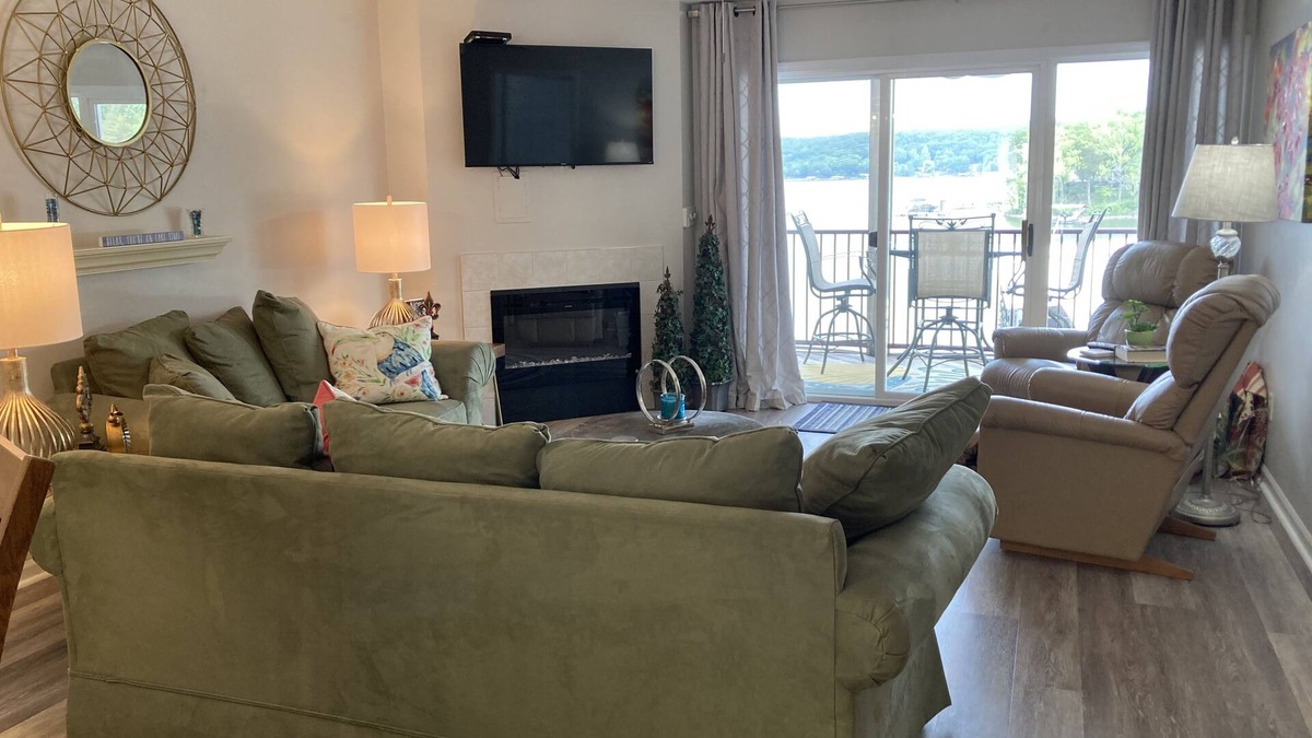Camdenton Condo | Relax on your screened in balcony overlooking the Lake. Two Golf Courses nearby.