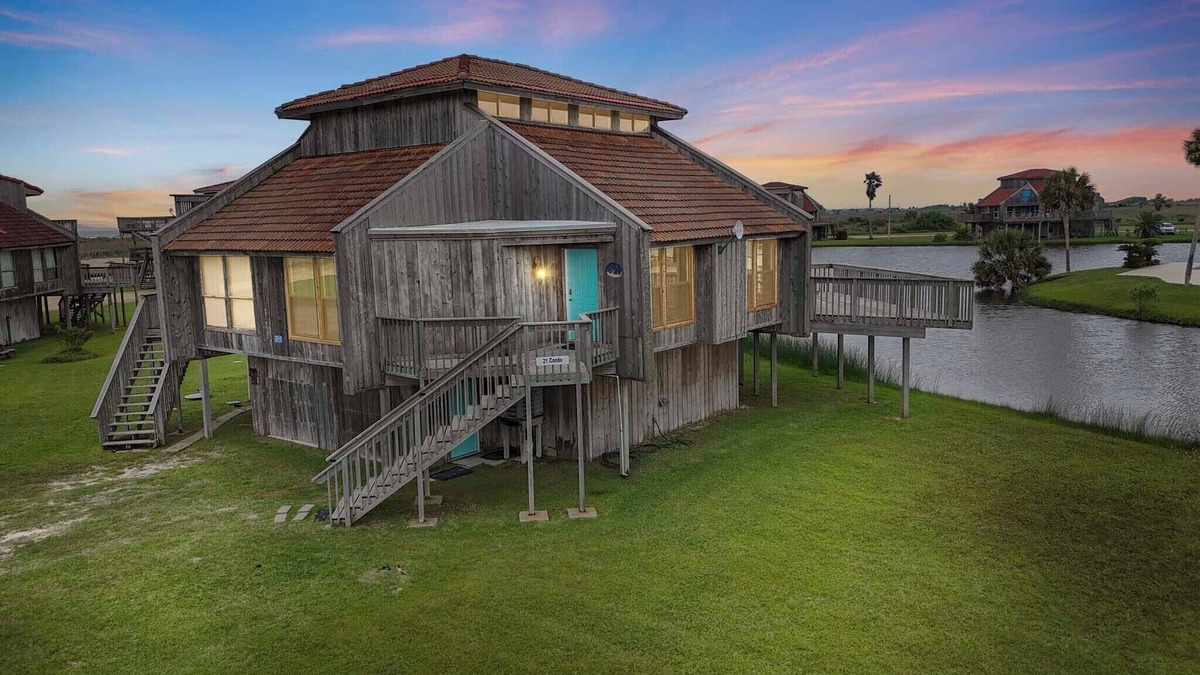 Matagorda Condo | Relax poolside with the whole family or hunt shells on the beach.