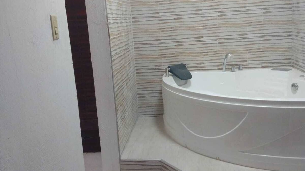 Spanish Town Zone House | Relax & Recharge in Spanish Town – 2BR Oasis w/Hot Tub, AC & Wi-Fi