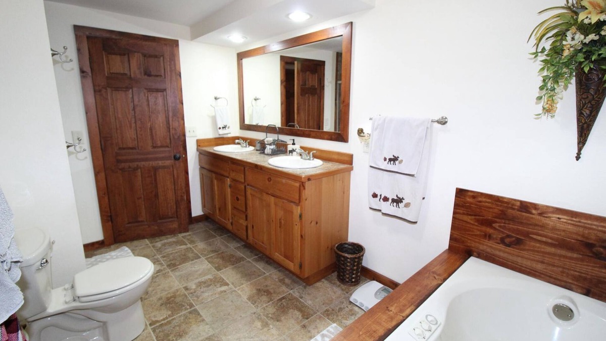 Grayling House | Relax, Unwind and Enjoy. Rustic log cabin with private Au Sable River Frontage!