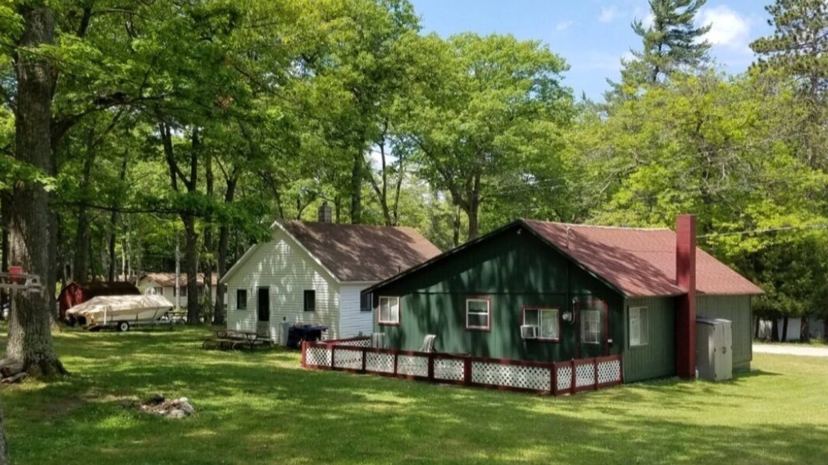Spruce Cottage | Remodeled cozy cottage & only a 5 minute walk to Hubbard Lake. Lots of parking!