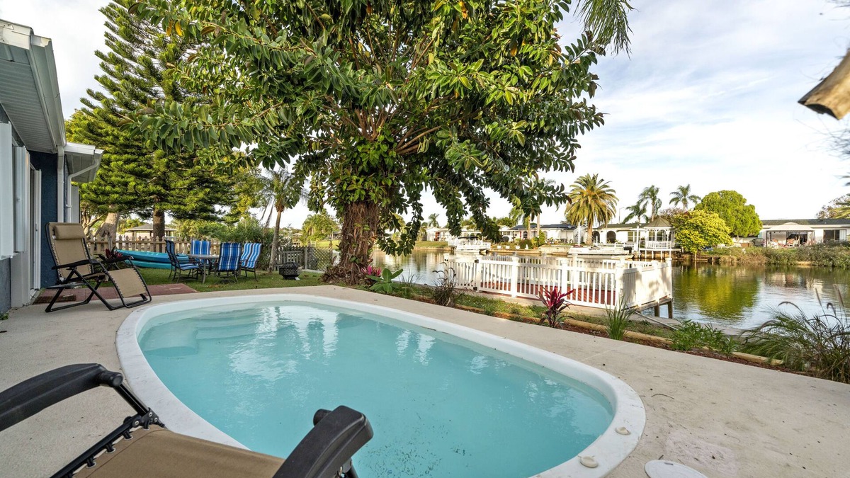 Tahitian Homes House | Remodeled Lake Front Pool Home! Sleeps 13! Bring dogs and kids!