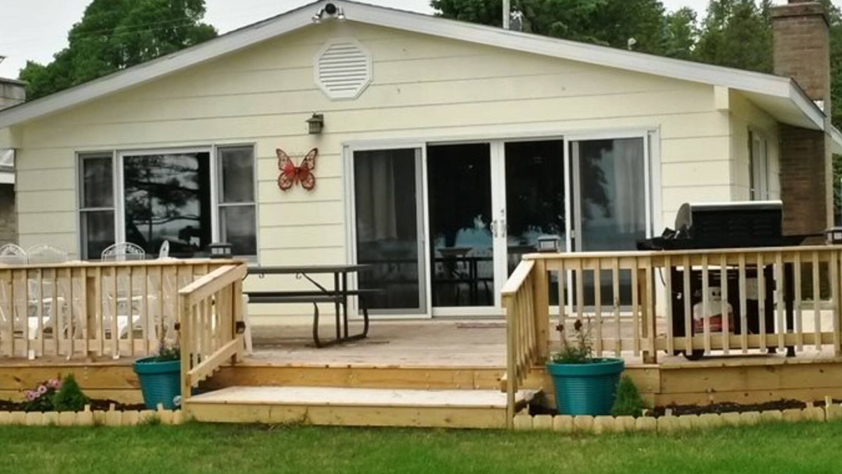 Onekama House | Remodeled, waterfront home on Portage Lake with dock & firepit - 2 dogs OK